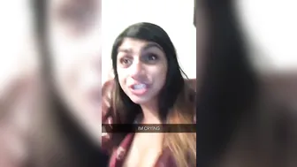 Mia Khalifa cutie covers her tits with her hand