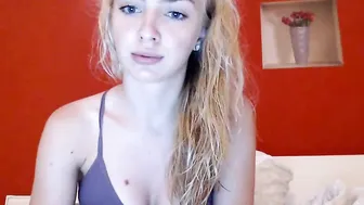 sunbunny Busty brunette caresses shaved vagina