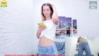 evacoy busty  cam girl  undresses and caresses her pussy