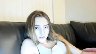 dirtyprettyboi busty  cam girl  caresses her lips.