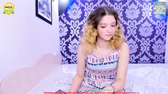 geneva_coy cute young lady puts on big tits