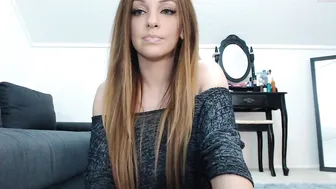 rebbecasnowshoe busty cam girl caresses her lips.