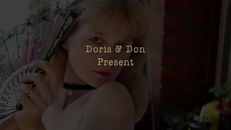 Doris Dawn a cool lady is dancing a striptease slowly