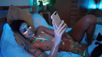 ocicat charming girl having fun with sex toy
