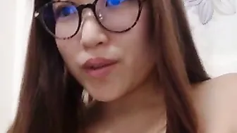 oneflowerasia Runette moans loudly from masturbation