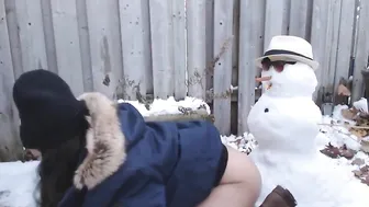 fucks a snowman in the backyard