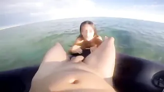Fingering cock on the beach