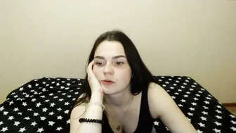 lustful_trio busty  cam girl  caresses her lips.
