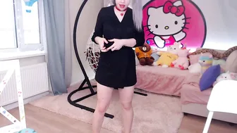 MiaMelon dancing near the christmas tree