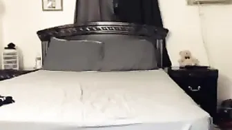 Dark haired doll gently pulls pussy
