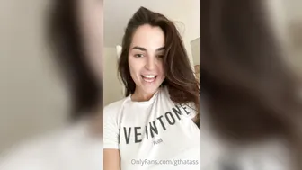 gthatass manyvids onlyfans busty  cam girl  caresses her lips.