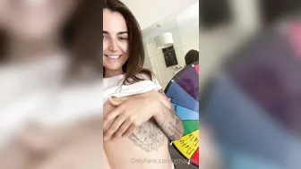 gthatass manyvids onlyfans busty  cam girl  caresses her lips.