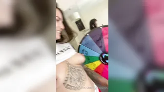 gthatass manyvids onlyfans busty  cam girl  caresses her lips.
