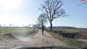 prostitute sucks a member of a client near the car