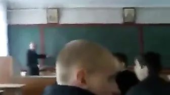 A student jerking off a guy at a lecture