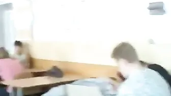 A student jerking off a guy at a lecture