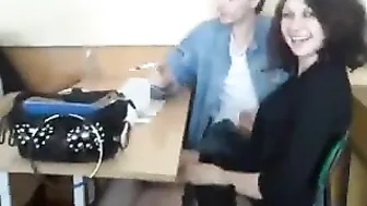 A student jerking off a guy at a lecture