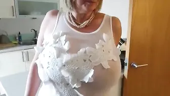 courtesananna pretty woman sitting in a chair
