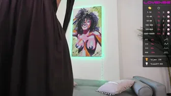 kleogold the luxury model is swaggering with two toys.