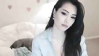 bunni Busty hottie caresses shaved pussy