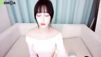b_meow pretty woman sitting in a chair