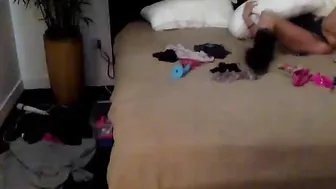 stripperhow2 Black haired prostitute posing in clothes