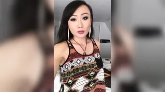 Venus Lux  black haired babe puts big tits