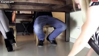 caresses a member during the lesson under the desk