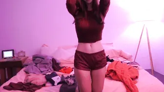 Katee Owen aka KateeLife onlyfans busty  cam girl  caresses her lips.