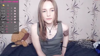 marie_blue busty  cam girl  caresses her lips.