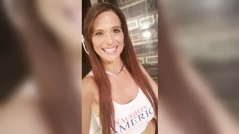 Syren De Mer pretty woman undressed in front of the camera and masturbates in the chair