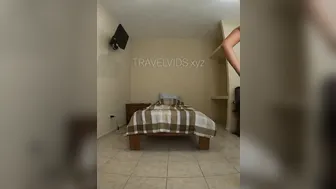 TravelVids Busty brunette sucks dildo