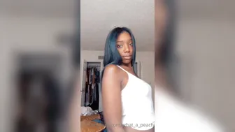 Cory aka what_a_peach onlyfans Adult woman arranging a portion of petting