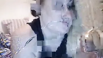 theaphrodite Charming shows off her tits.