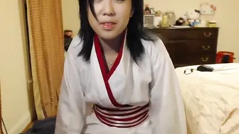 kittymei runet wriggles in front of webcam