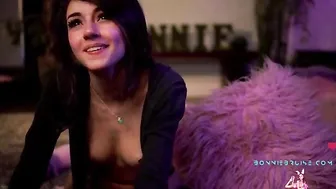 Bonniebruise Pretty woman dabbles with a toy