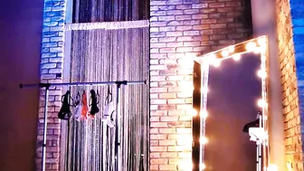 rocknrose Black haired prostitute posing in clothes